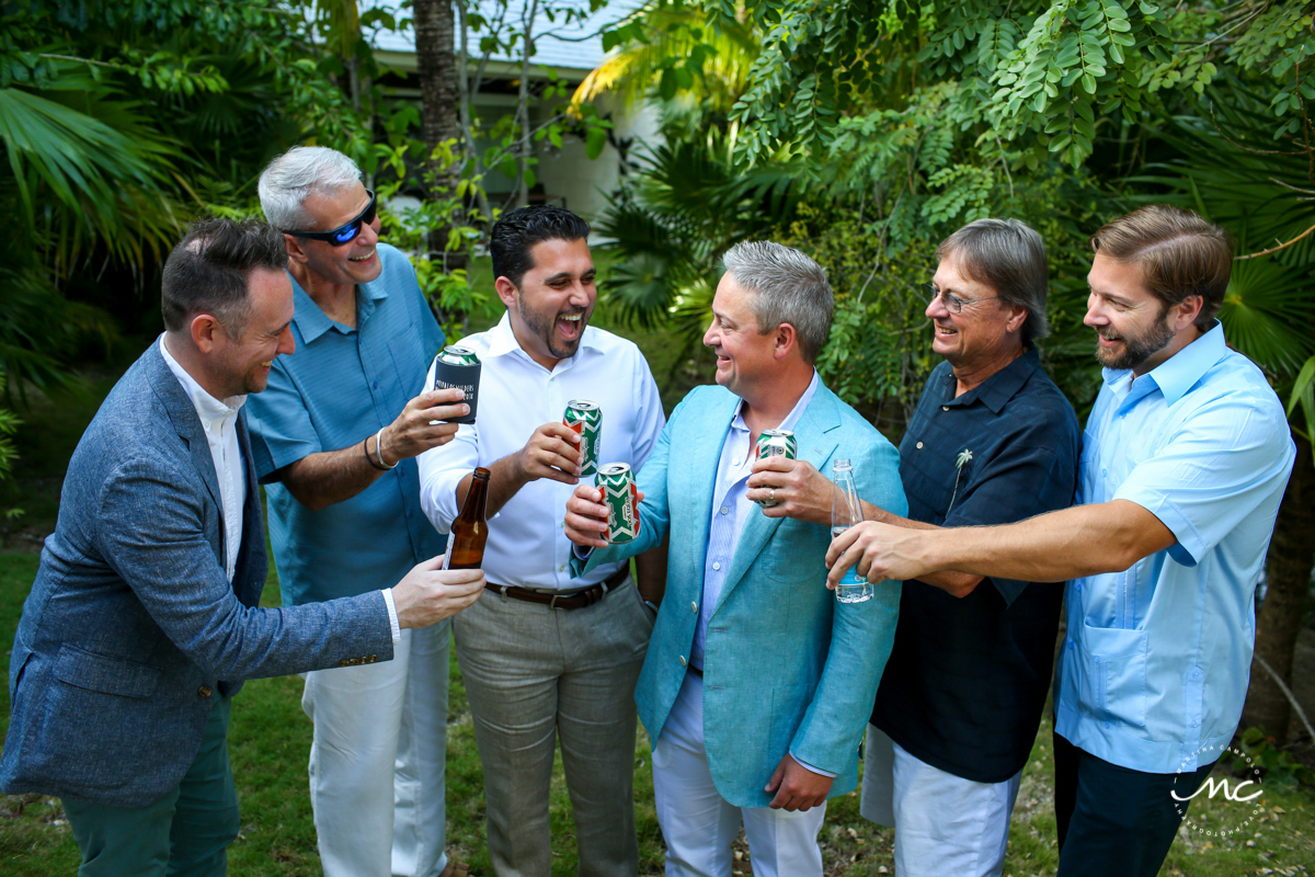 Groom and groomsmen fun shot at Blue Diamond Luxury Boutique Hotel, Mexico. Martina Campolo Photography