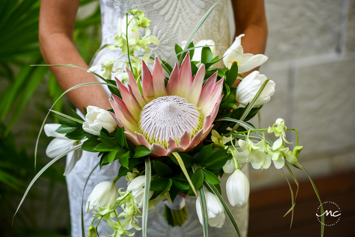 Luxury bridal bouquet with king protea and orchids. Martina Campolo Mexico Wedding Photography