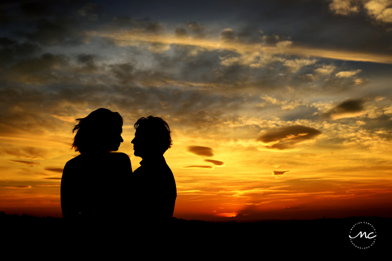 Couple silhouette at sunset. Castello di Trisobbio Engagement. Martina Campolo Photography