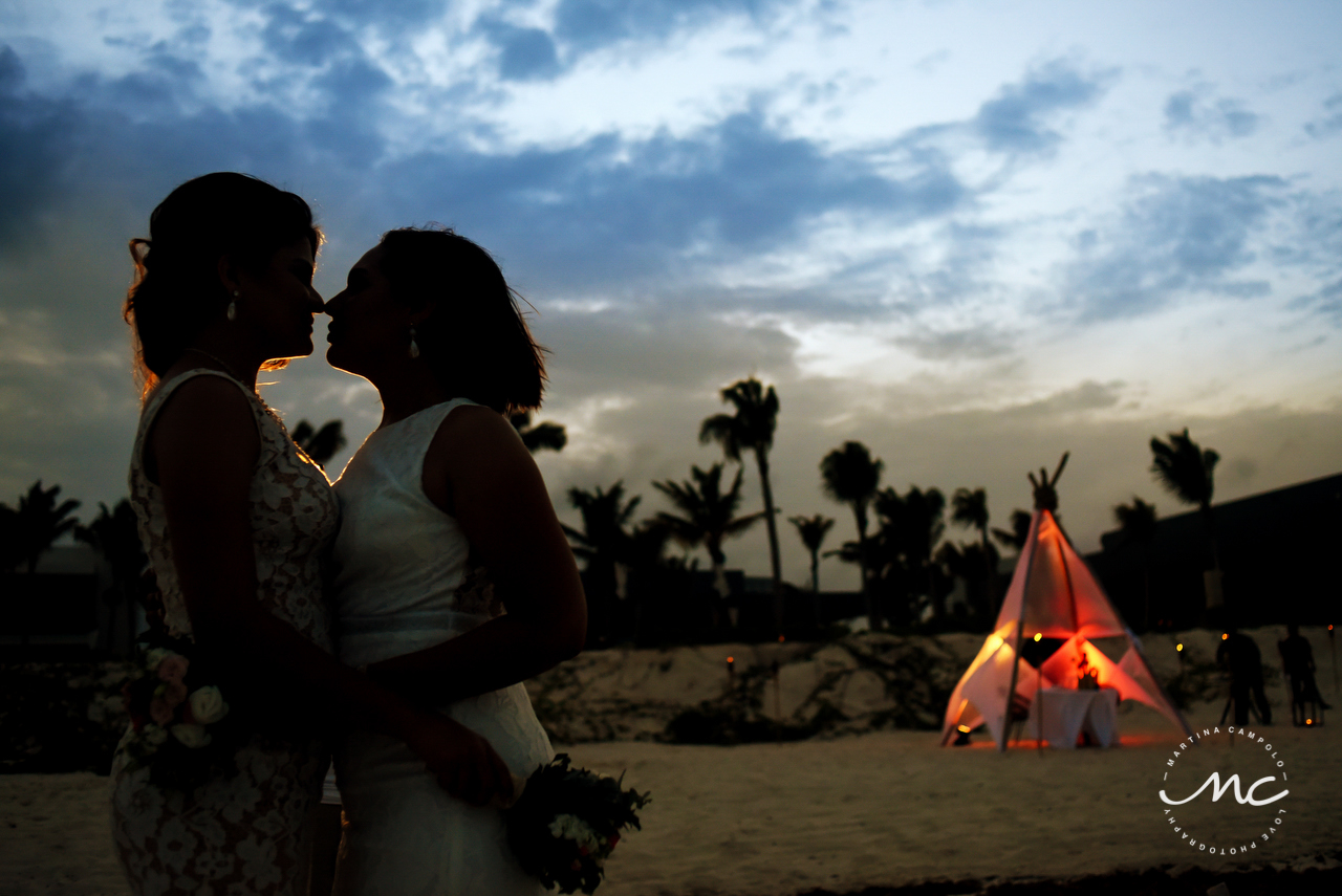 Brides silhouette at dusk. Andaz Mayakoba Wedding by Martina Campolo Photography