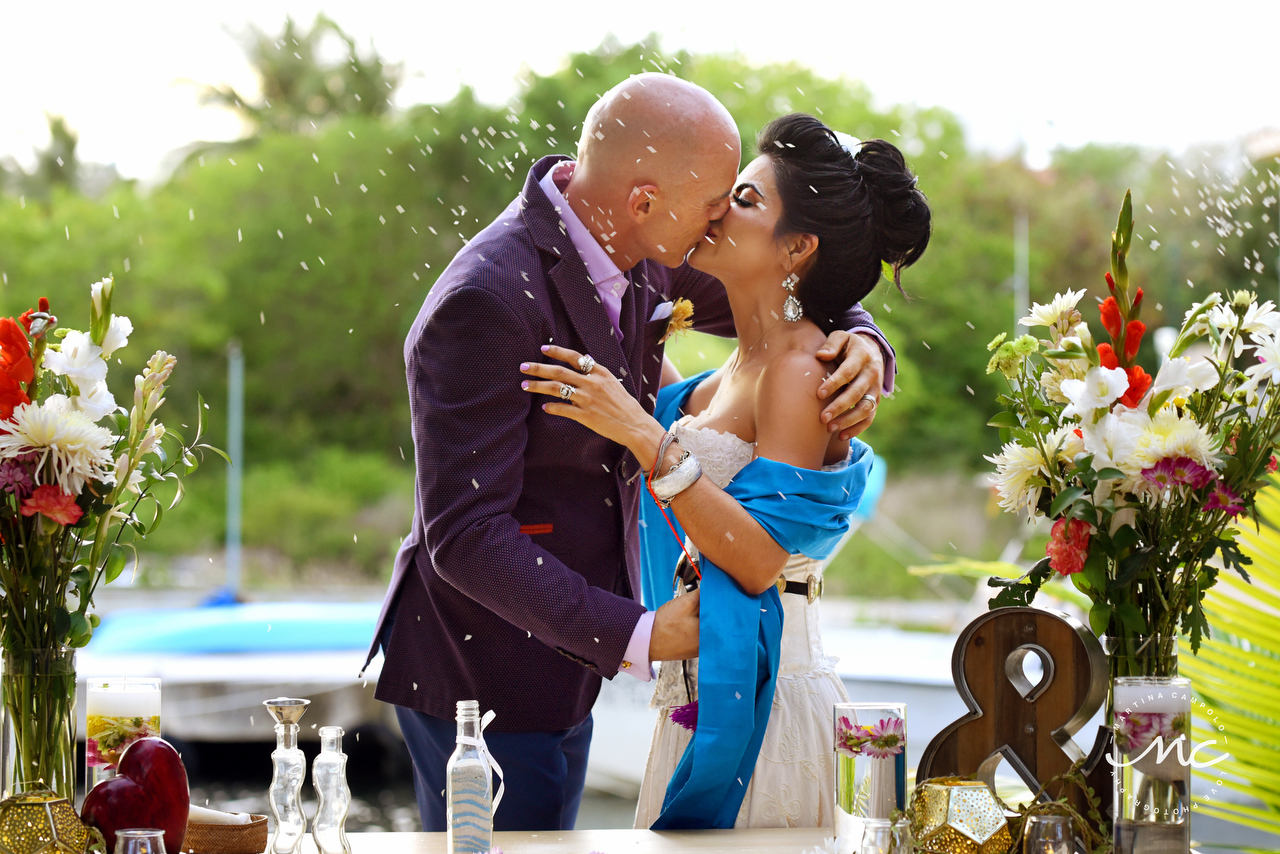 You may kiss the bride! Puerto Aventuras Wedding in Mexico. Martina Campolo Photography