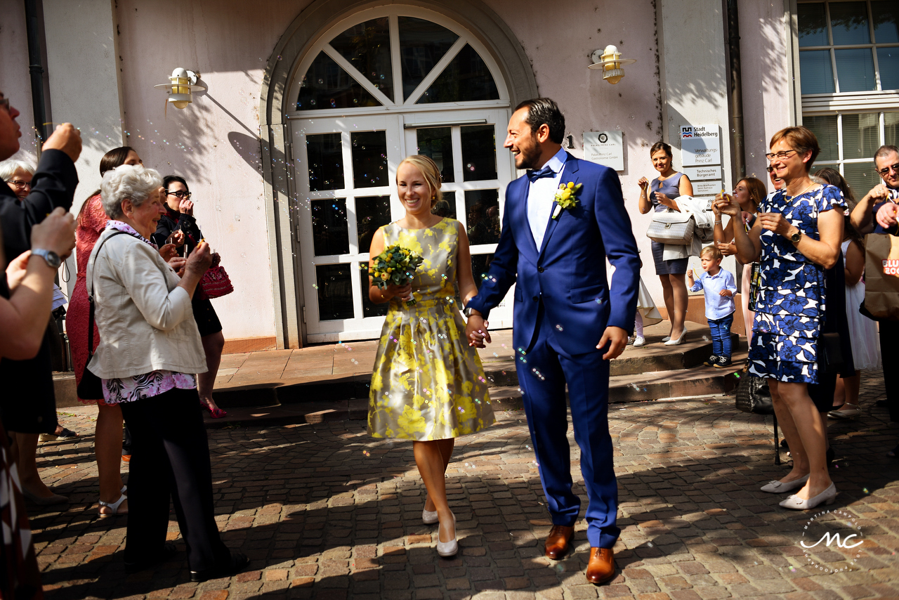 Bride and groom exit. Intimate German Wedding in Heidelberg. Martina Campolo Photography