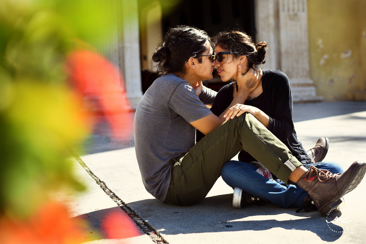 Engaged couple kiss during engagement session in Merida, Mexico. Martina Campolo Photography