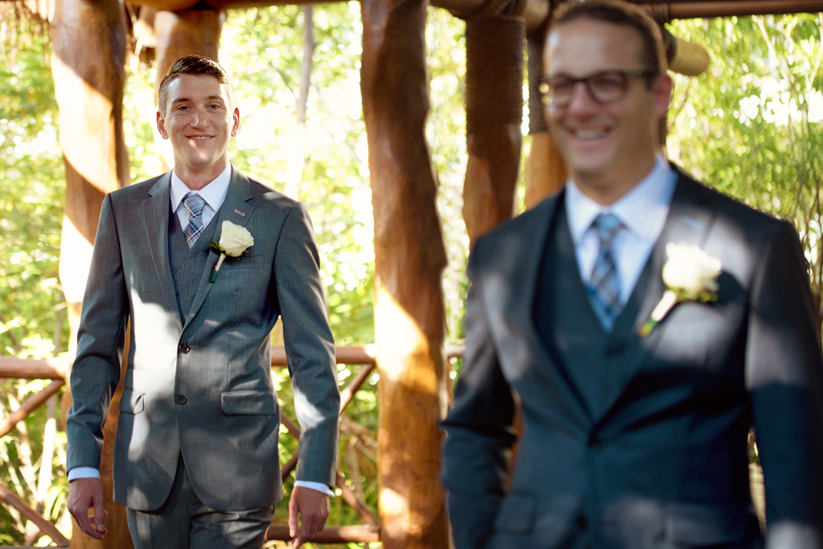 First look moment by Martina Campolo LGBTQ Wedding Photography in Riviera Maya, Mexico