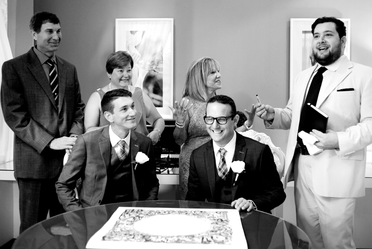 Grooms ready to sign the Ketubah at Paradisus Playa del Carmen Gay Wedding by Martina Campolo Photography