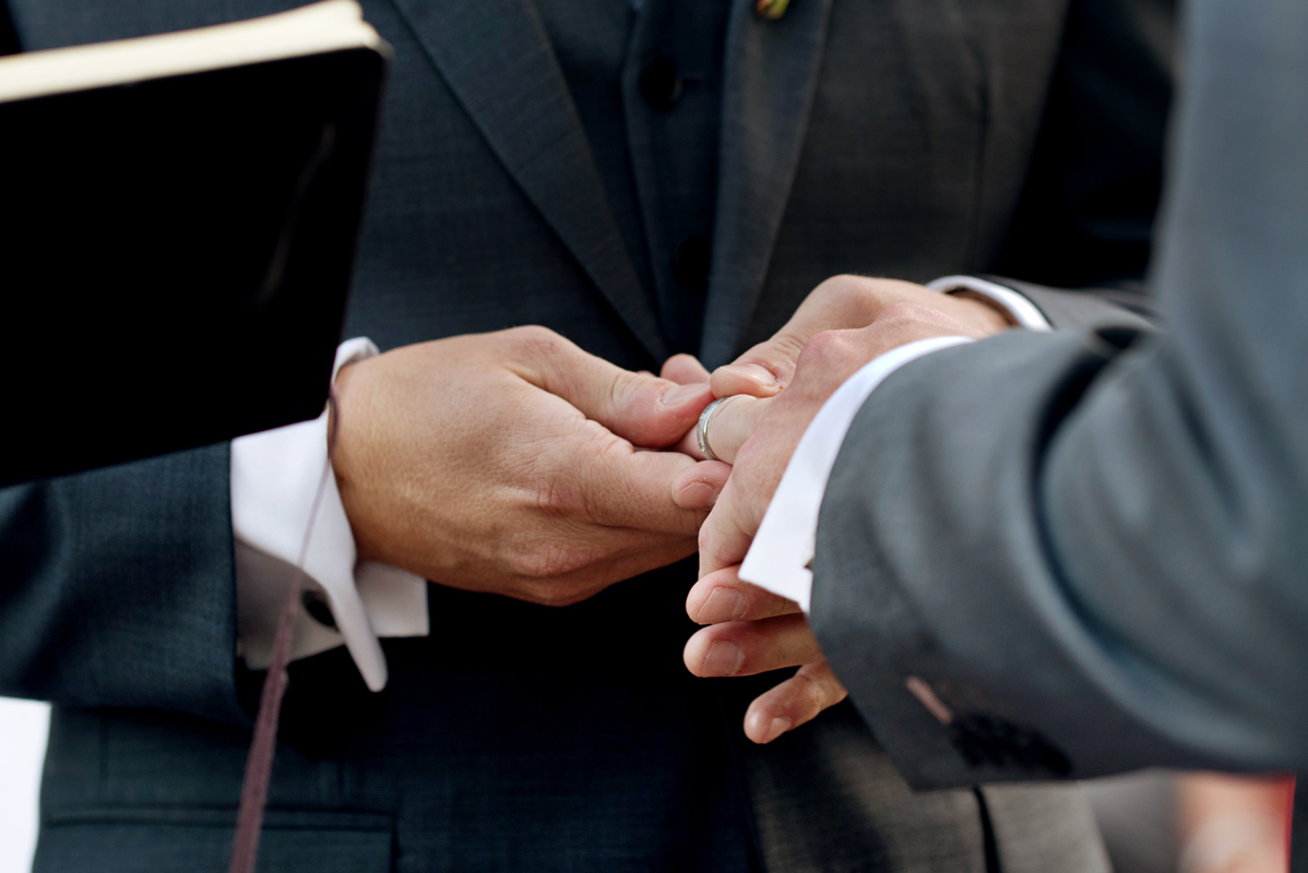 Wedding ring exchange moment by Martina Campolo Gay Destination Wedding Photography in Mexico