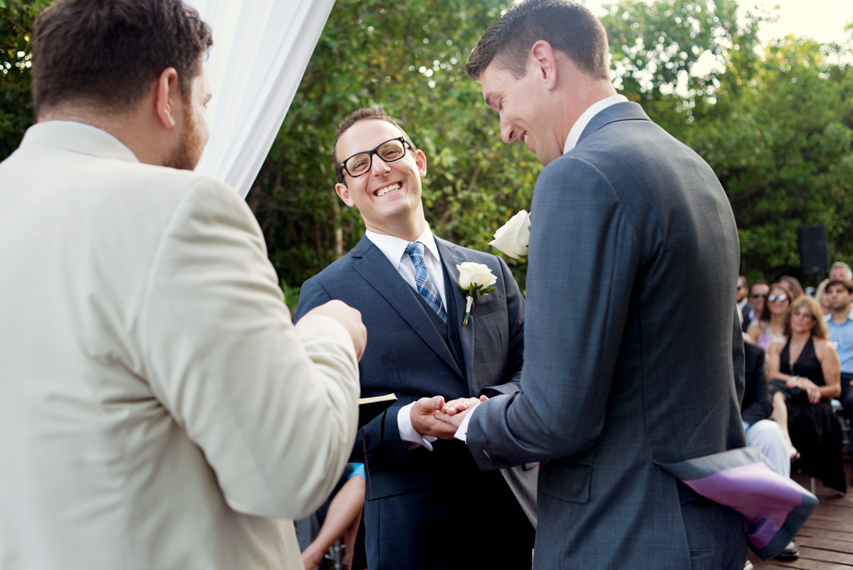 Sweet wedding ceremony moment by Martina Campolo LGBTQ Wedding Photography in Riviera Maya, Mexico.