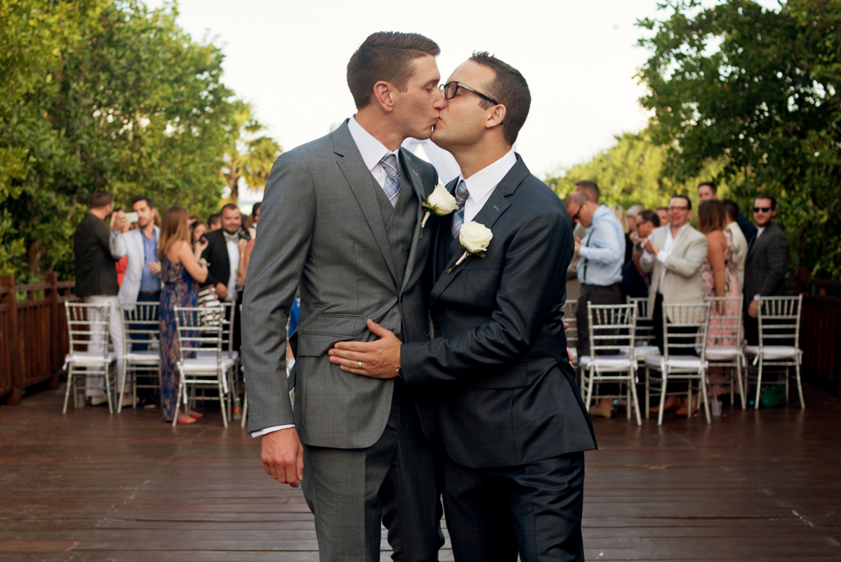 Groom and groom ceremony exit. Paradisus Playa del Carmen destination wedding by Martina Campolo Photography