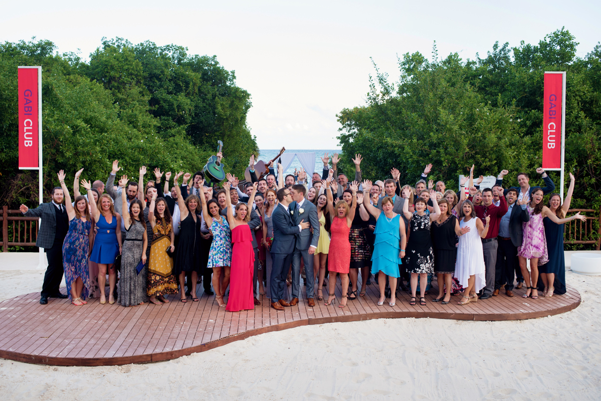 Wedding group photo at Gabi Bridge, Paradisus Playa del Carmen, Mexico. Martina Campolo Photography