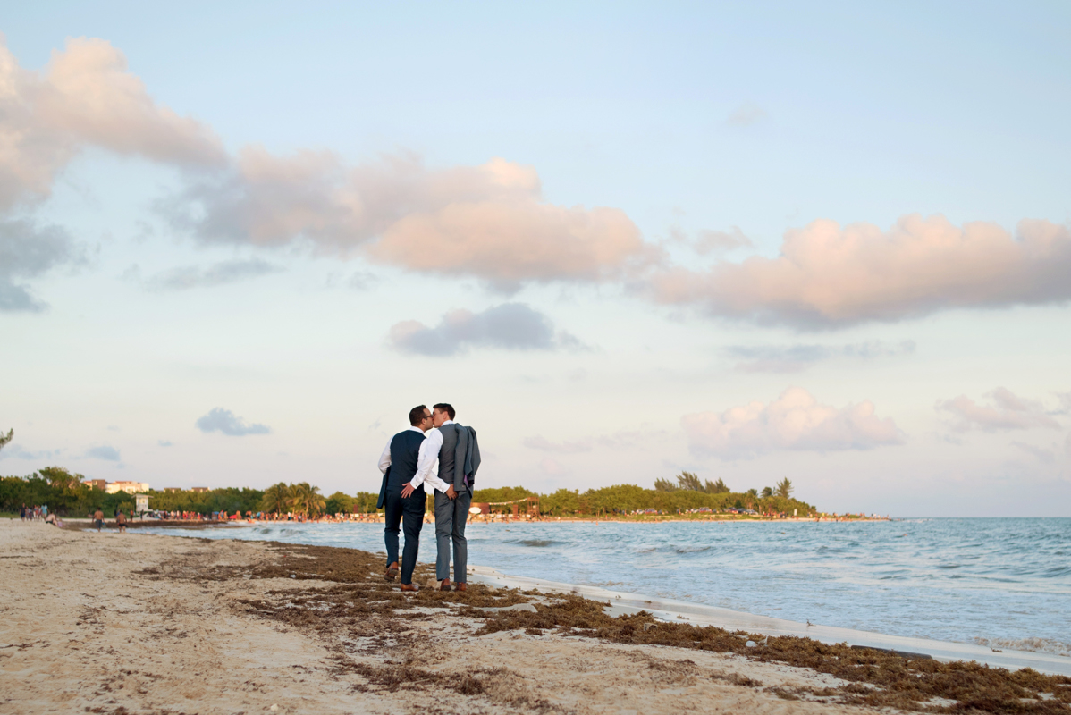 Groom and groom beach portraits in Riviera Maya, Mexico by Martina Campolo LGBTQ Wedding Photography