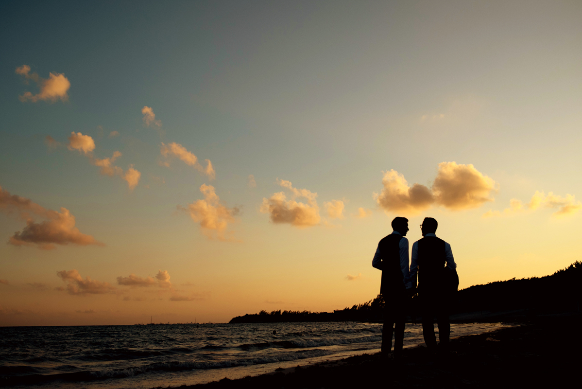 Groom and groom sunset beach portraits by Martina Campolo Jewish Wedding Photography in Mexico