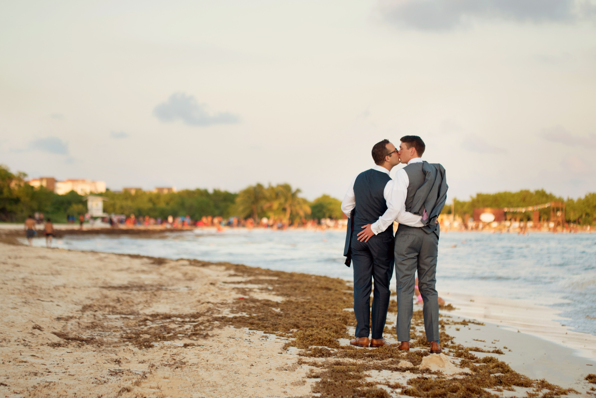 Groom and groom beach portraits by Martina Campolo Jewish Wedding Photography in Mexico.