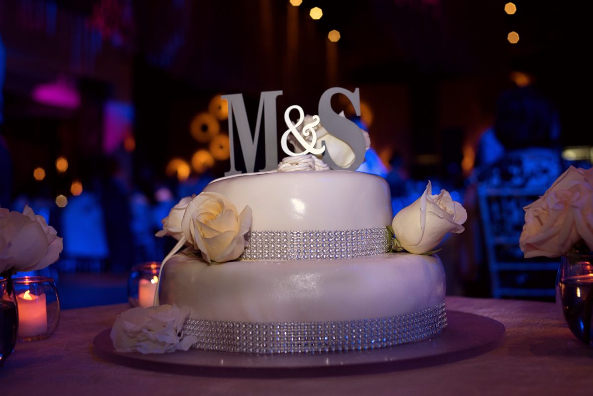 Two-tier wedding cake at Paradisus Playa del Carmen, Mexico. Martina Campolo Destination Wedding Photography