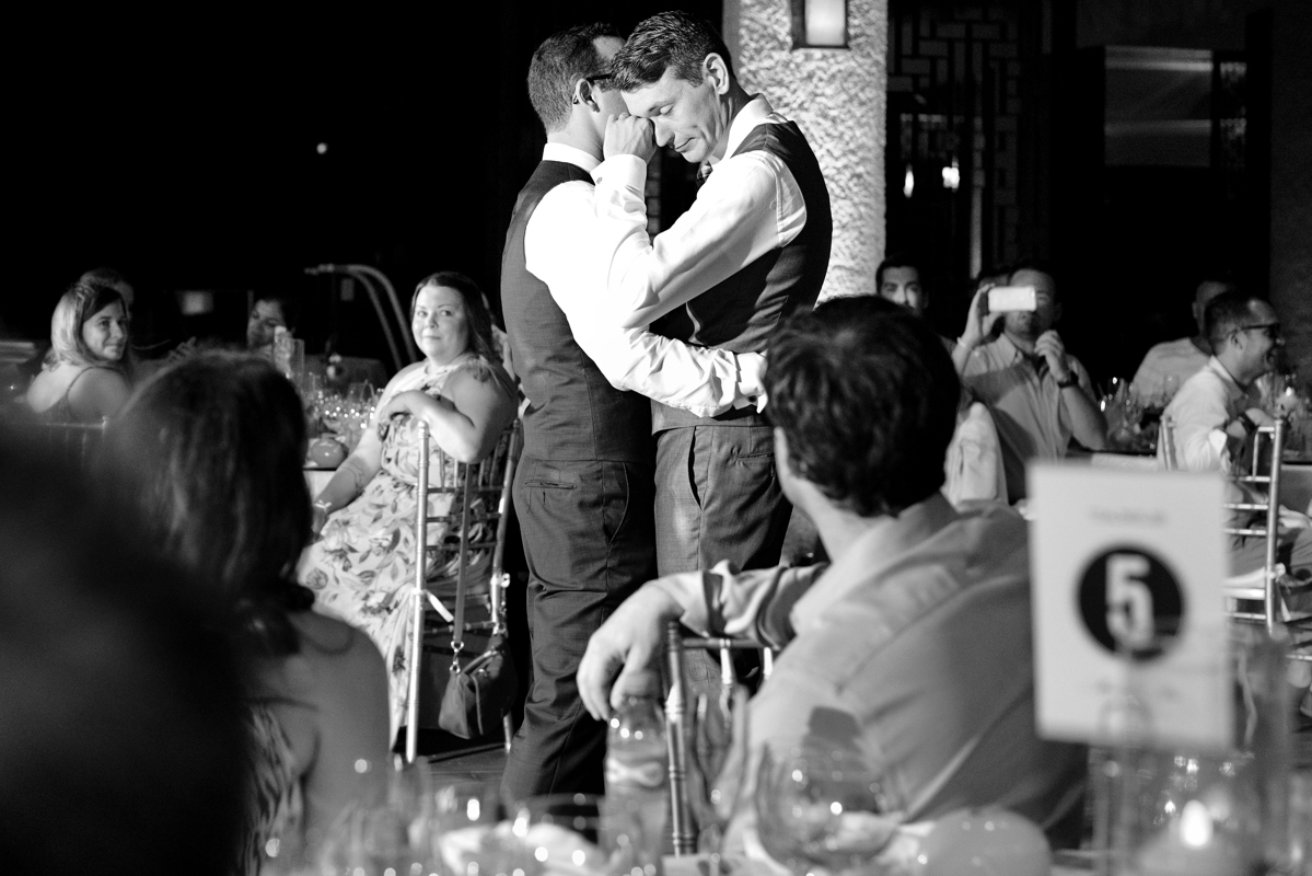 Emotional first dance moment in black and white by Martina Campolo LGBTQ Wedding Photography, Riviera Maya, Mexico