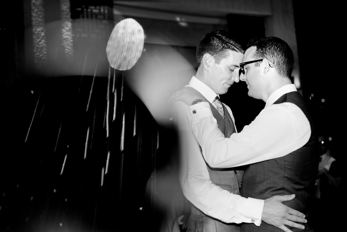 Groom and groom first dance moment at Paradisus Playa del Carmen, Mexico. Martina Campolo LGBTQ Wedding Photography