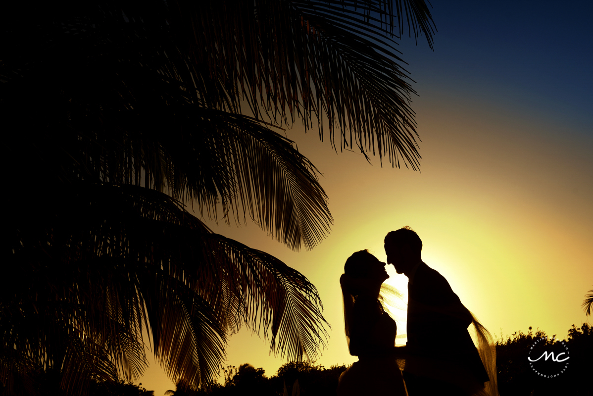 Bride and groom silhouettes at Blue Venado Beach in Mexico. Martina Campolo Photography