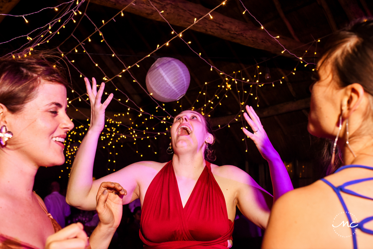 Wedding guests dance at Blue Venado Wedding in Playa del Carmen. Martina Campolo Photography