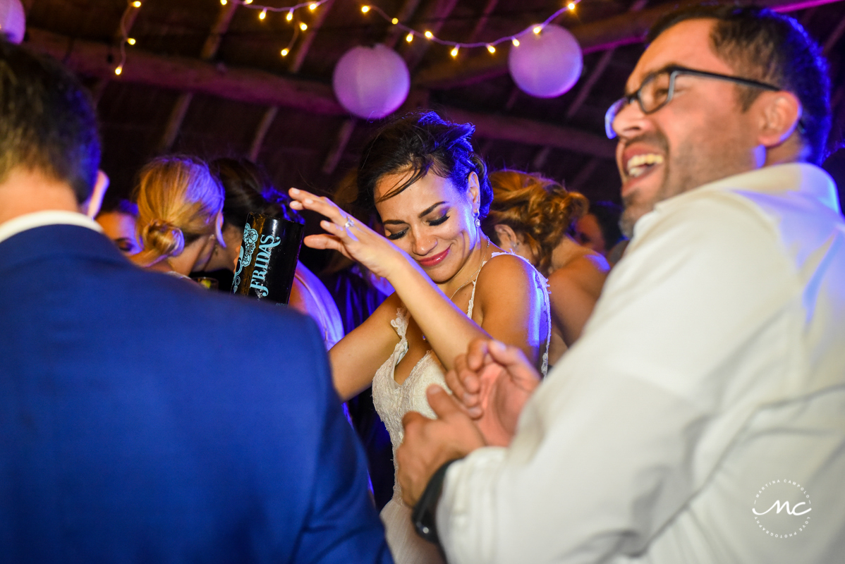 Happy dancing bride at Blue Venado Wedding Reception in Mexico. Martina Campolo Photography