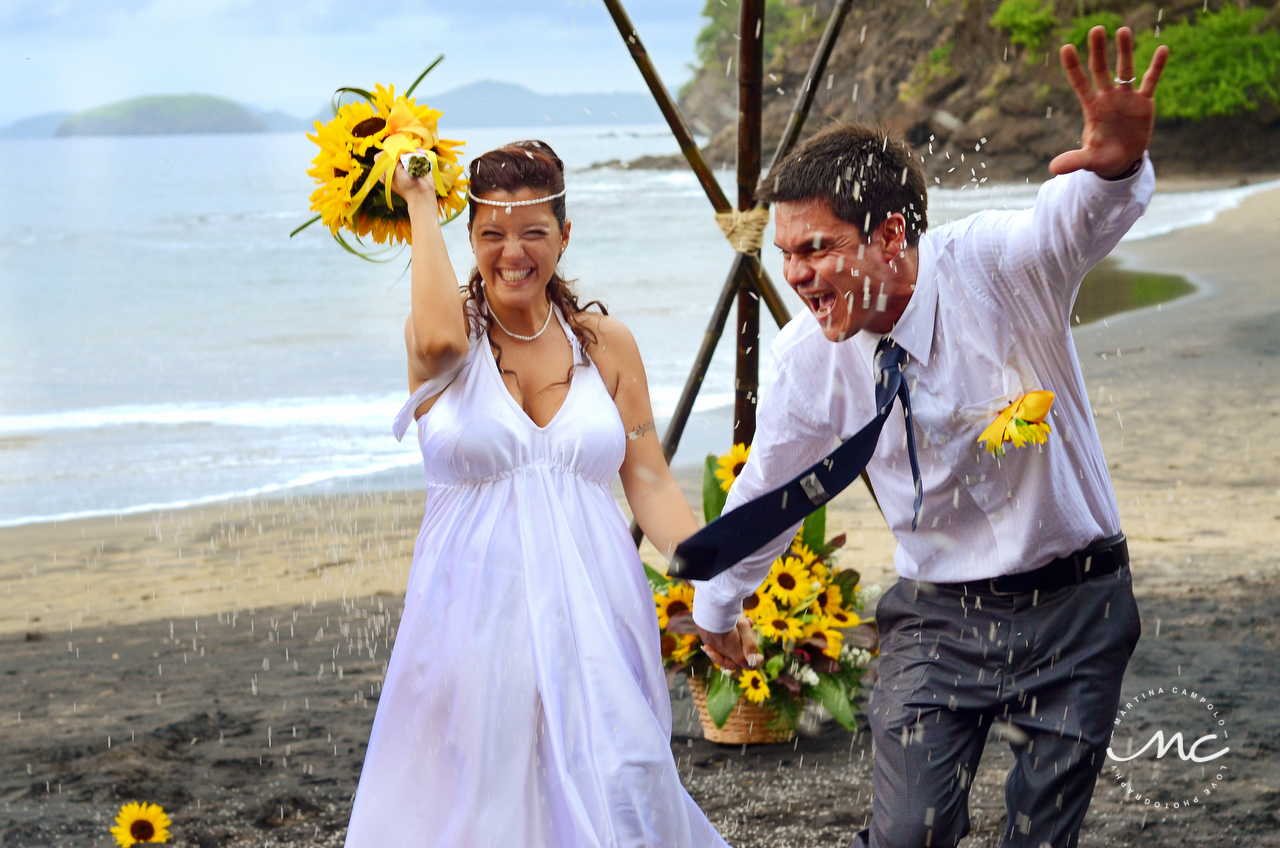 Rice toss. Playa del Coco, Costa Rica Destination Wedding. Martina Campolo Photography