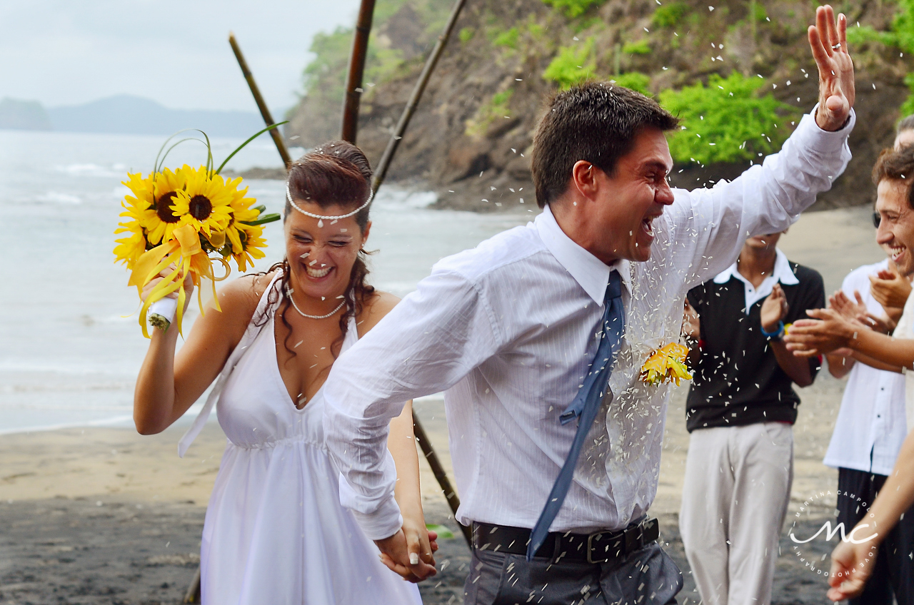 Rice toss. Playa del Coco, Costa Rica Destination Wedding. Martina Campolo Photography