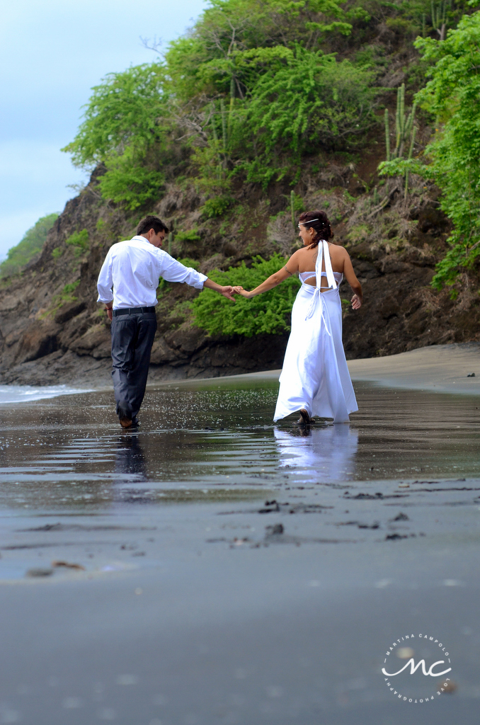 Bride and groom beach portraits in Playa Hermosa, Costa Rica. Martina Campolo Photography