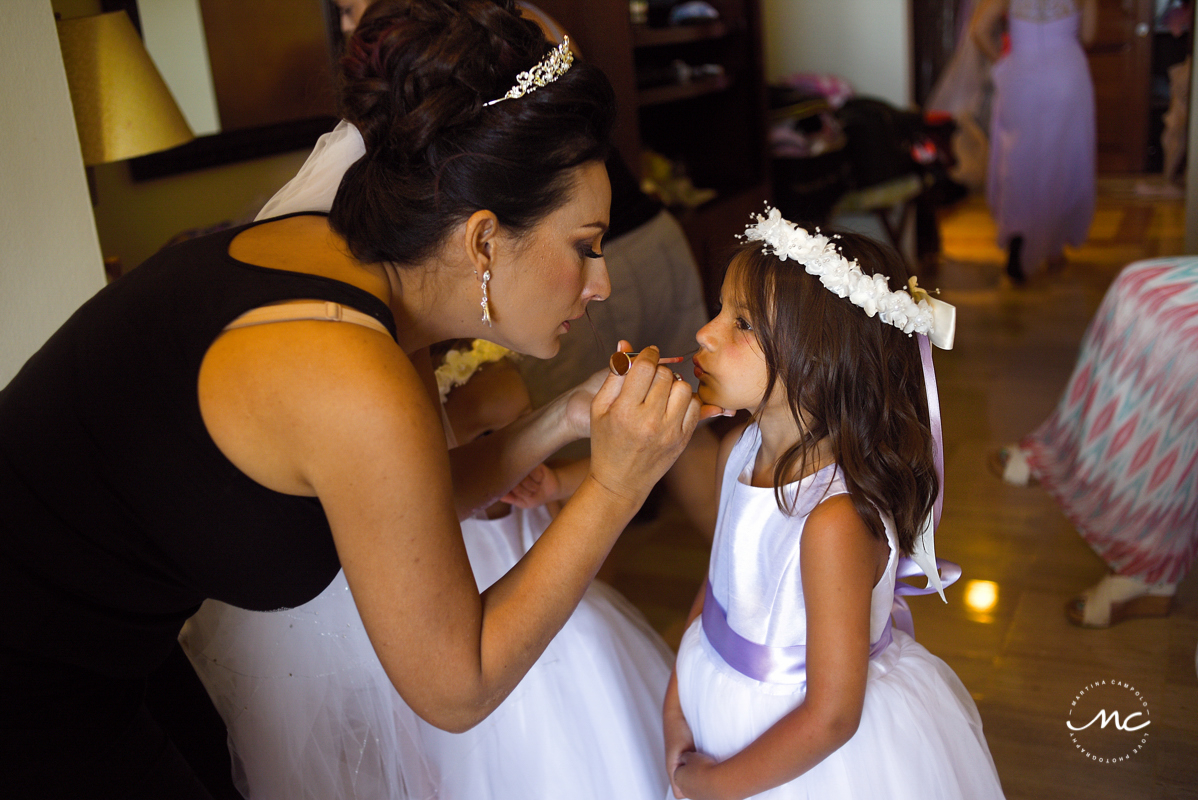 Destination bride and flower girl getting ready at Now Sapphire Hotel in Mexico. Martina Campolo Photography