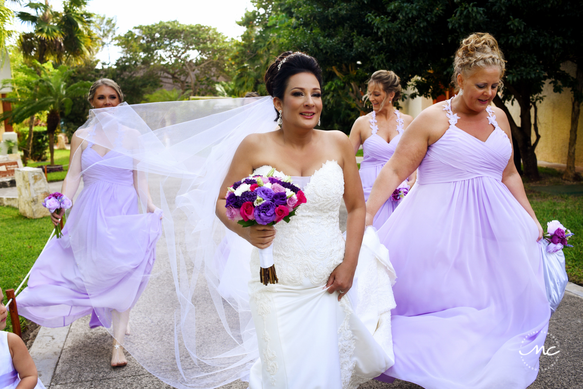 Beach bride and lilac bridesmaids. Now Sapphire destination wedding in Mexico by Martina Campolo Photography