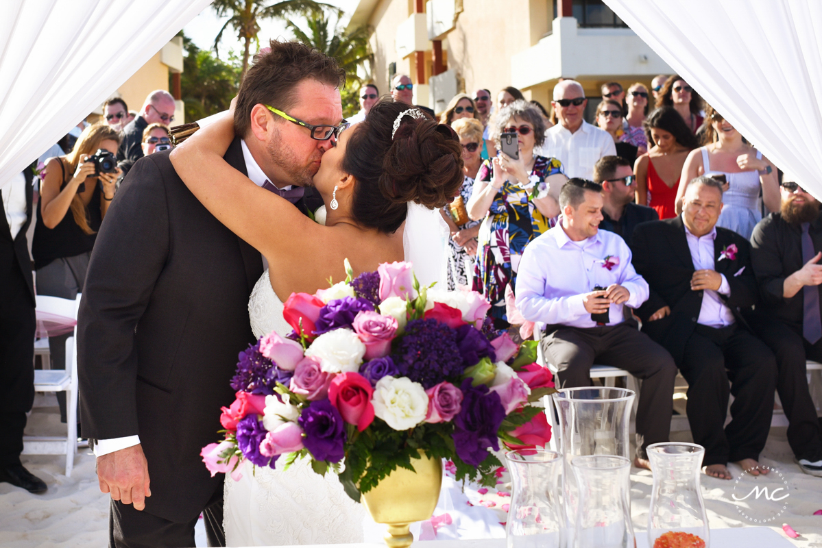 Bride and groom kiss. Martina Campolo Now Sapphire Riviera Cancun Wedding Photography