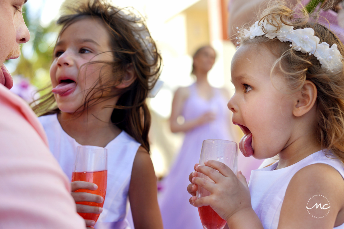 Thirsty flower girls at Now Sapphire Riviera Cancun wedding. Martina Campolo Photography