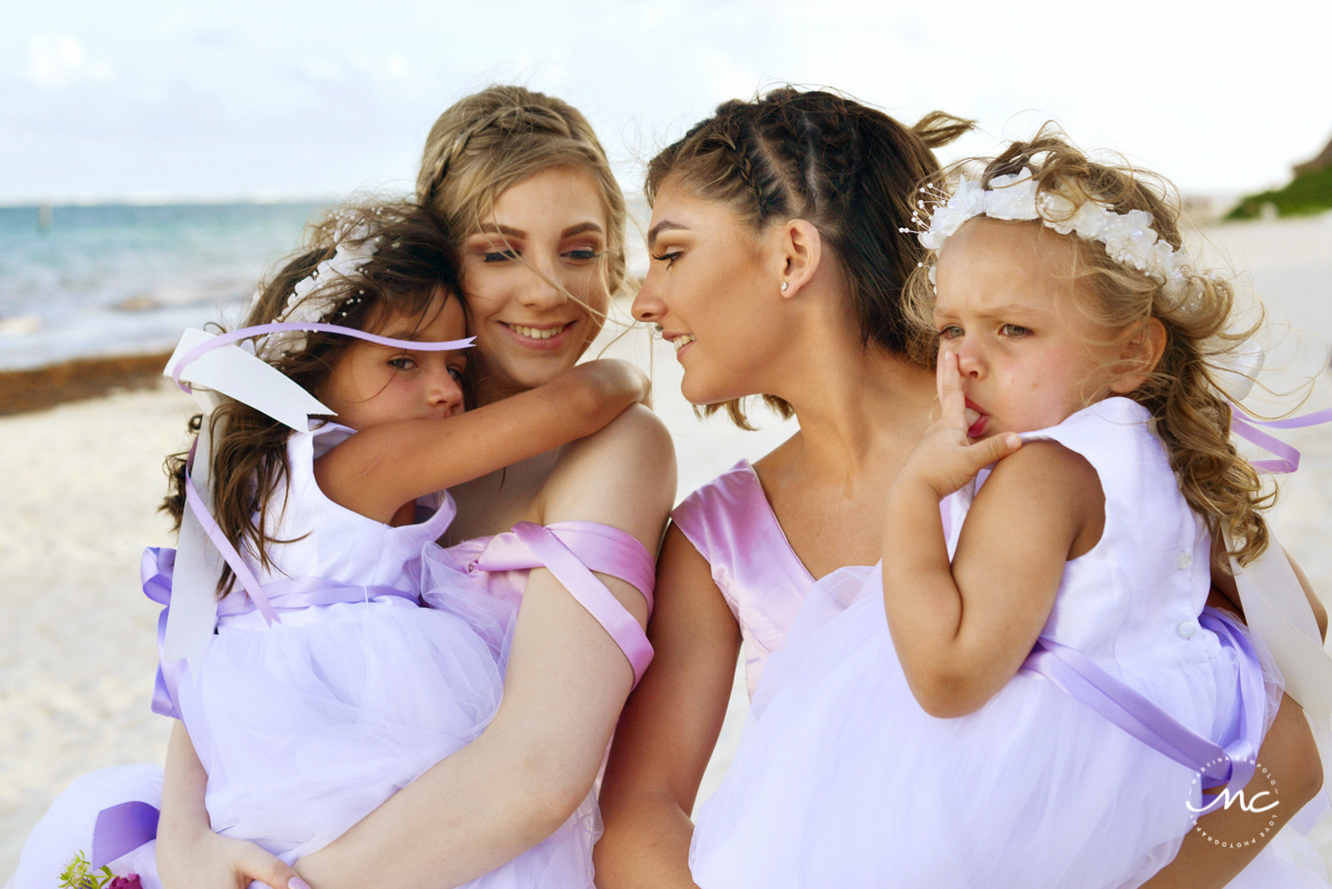 Lilac bridesmaids and flower girls. Now Sapphire Riviera Cancun wedding by Martina Campolo Photography