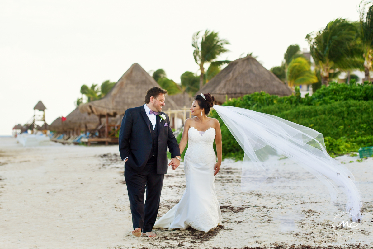 Bride and groom beach portraits at Now Sapphire Riviera Cancun, Mexico. Martina Campolo Photography