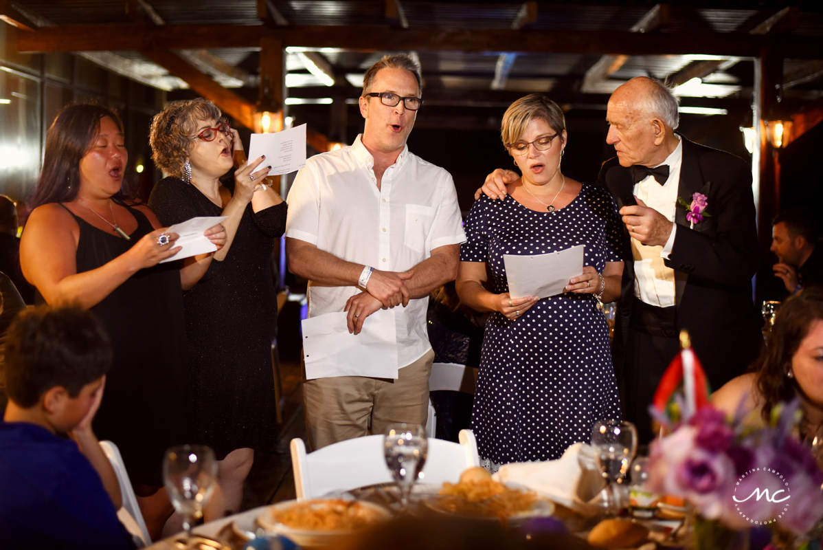 Wedding guests sing at Now Sapphire Riviera Cancun wedding. Martina Campolo Photography