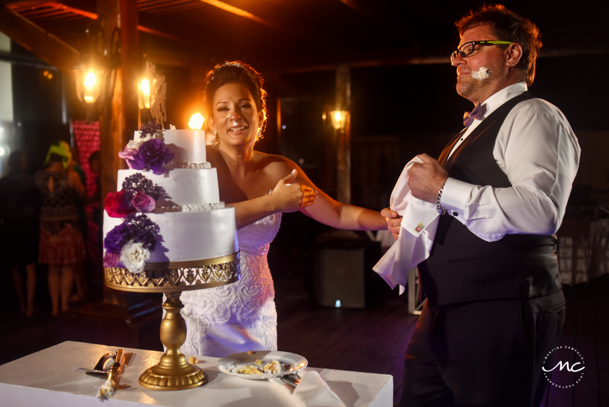 Cake cutting. Now Sapphire Riviera Cancun destination wedding by Martina Campolo Photography