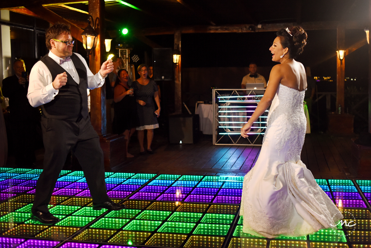 Bride and groom dance. Now Sapphire Riviera Cancun wedding by Martina Campolo Photography