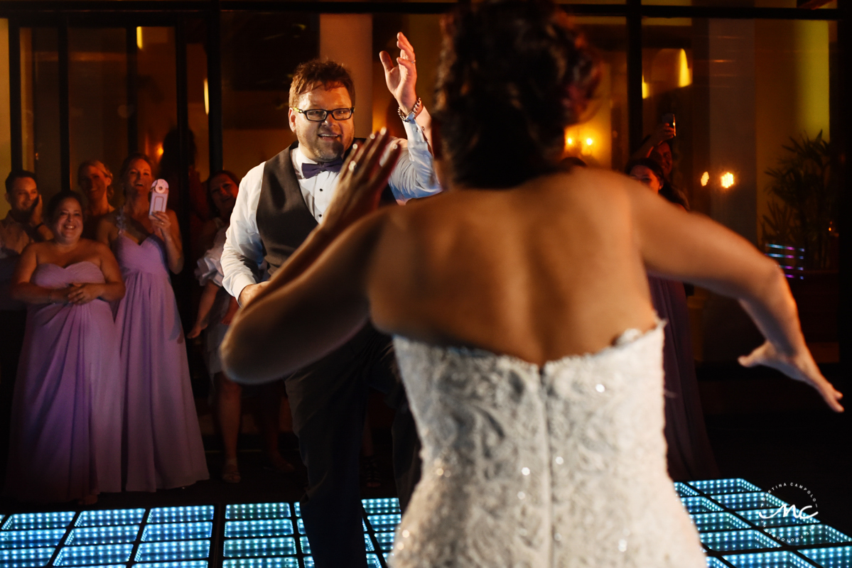 Bride and groom dance. Now Sapphire Riviera Cancun wedding by Martina Campolo Photography