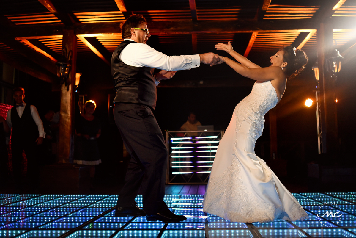 Bride and groom dance. Now Sapphire Riviera Cancun destination wedding by Martina Campolo Photography