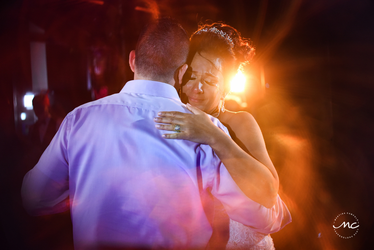 Emotional bride. Now Sapphire Riviera Cancun wedding reception by Martina Campolo Photography