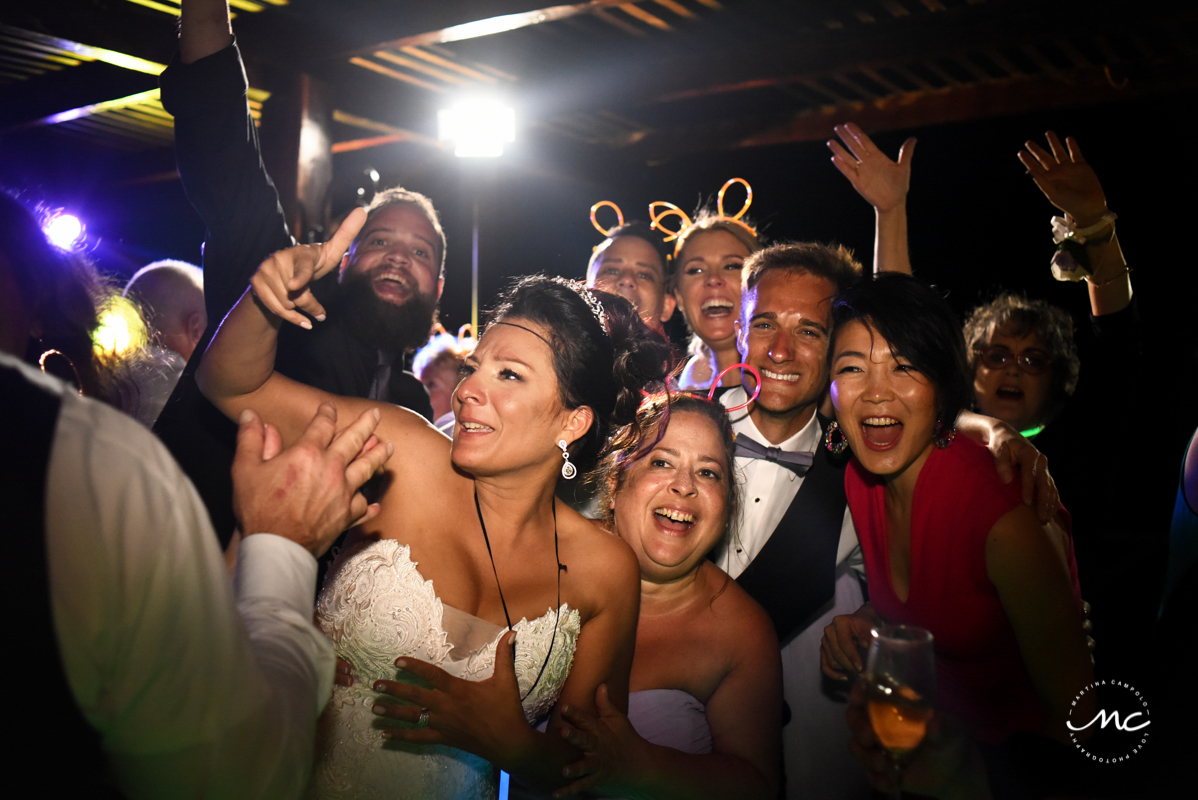 Fun wedding reception moment at Now Sapphire Riviera Cancun. Martina Campolo Photography