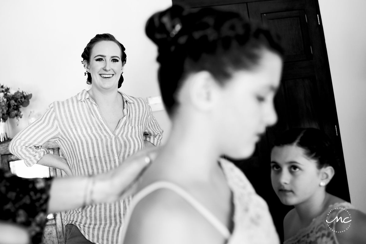 Black and white photo of bride getting ready for her Hacienda del Mar wedding in Mexico. Martina Campolo Photography