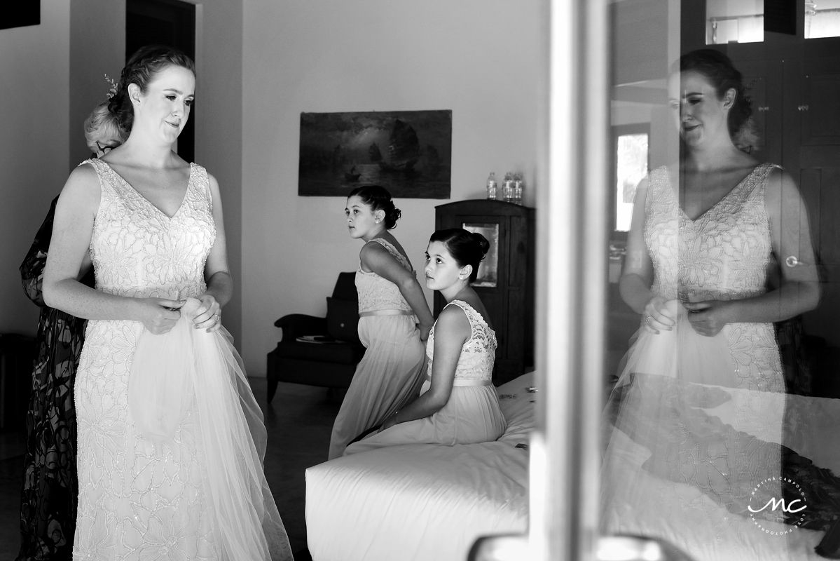 Black and white photo of bride getting ready at Hacienda del Mar, Puerto Aventuras, Mexico. Martina Campolo Photography