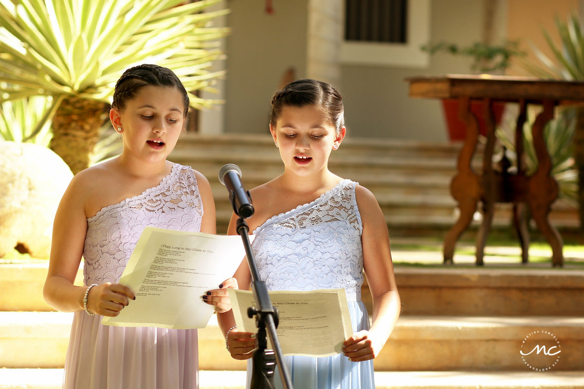 Girls sing for a wedding ceremony at Hacienda del Mar, Riviera Maya, Mexico. Martina Campolo Photography