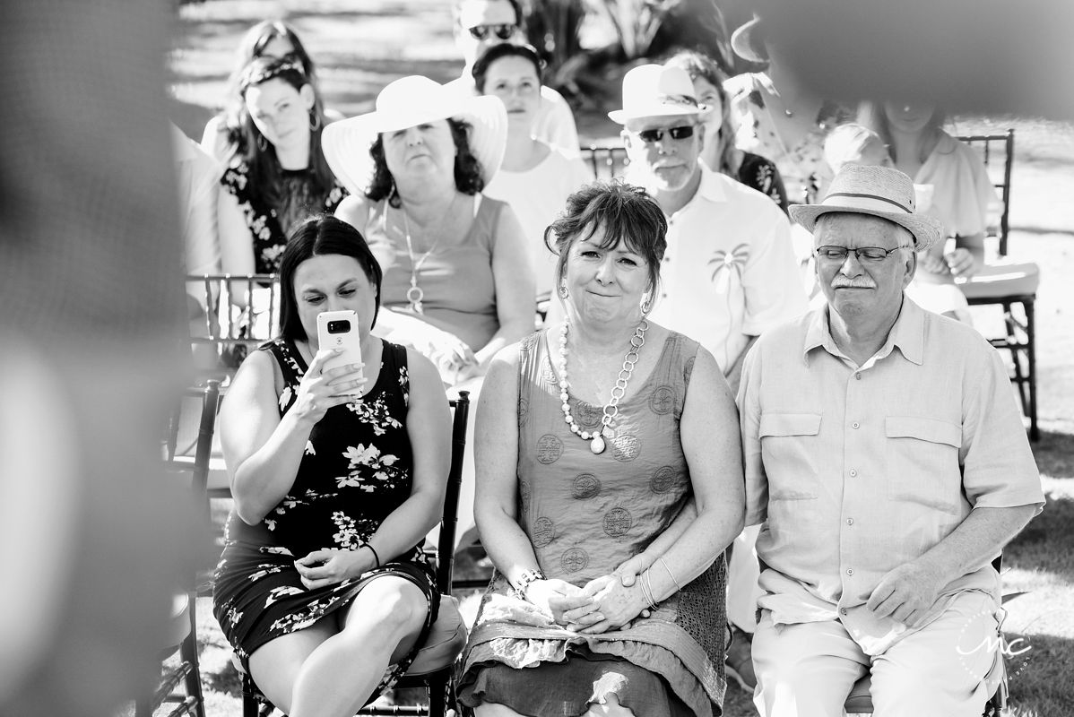 Black and white photo of wedding guests at Hacienda del Mar, Puerto Aventuras, Mexico. Martina Campolo Photography