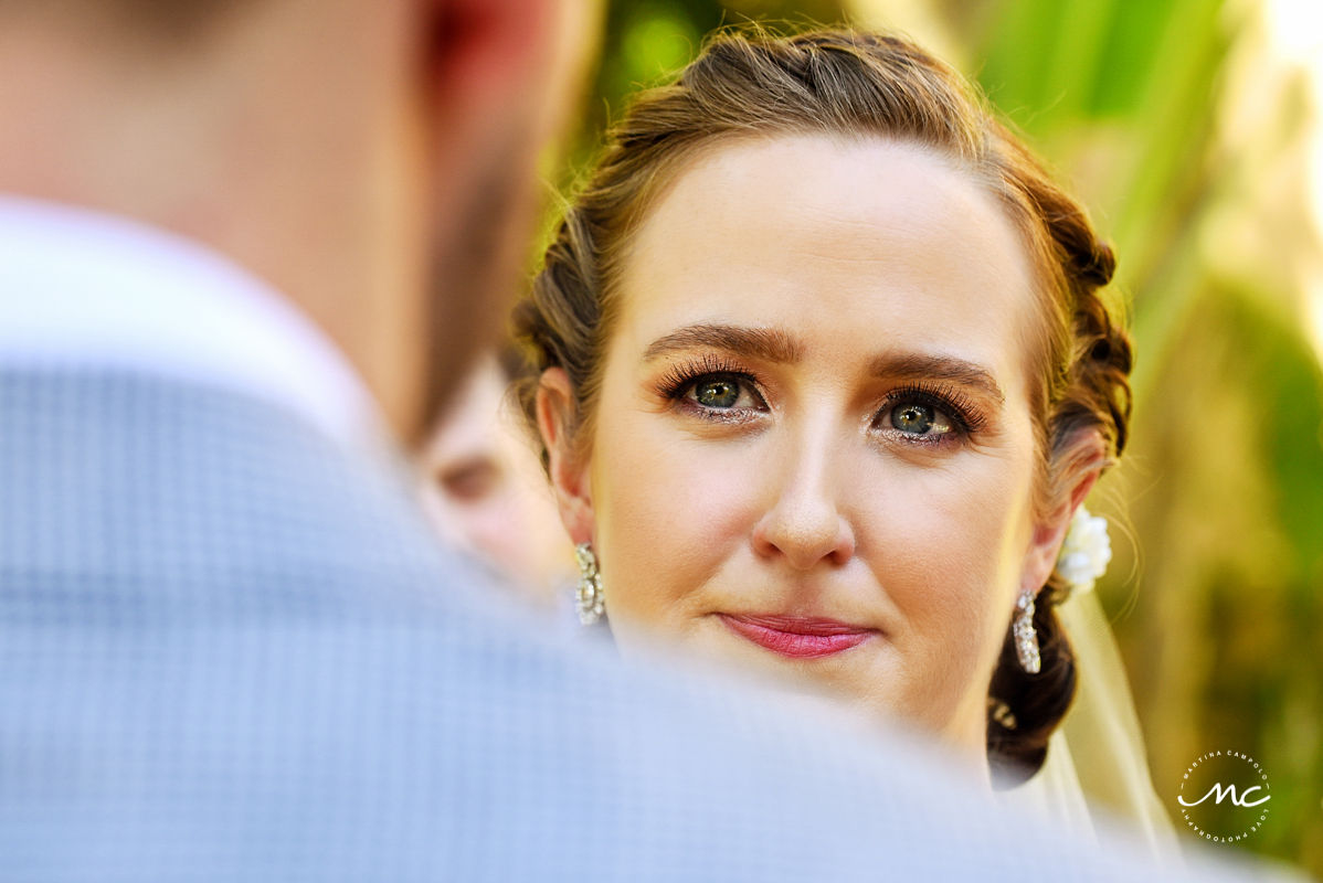 Closeup pic of bride at wedding ceremony in Hacienda del Mar, Puerto Aventuras, Mexico. Martina Campolo Photography