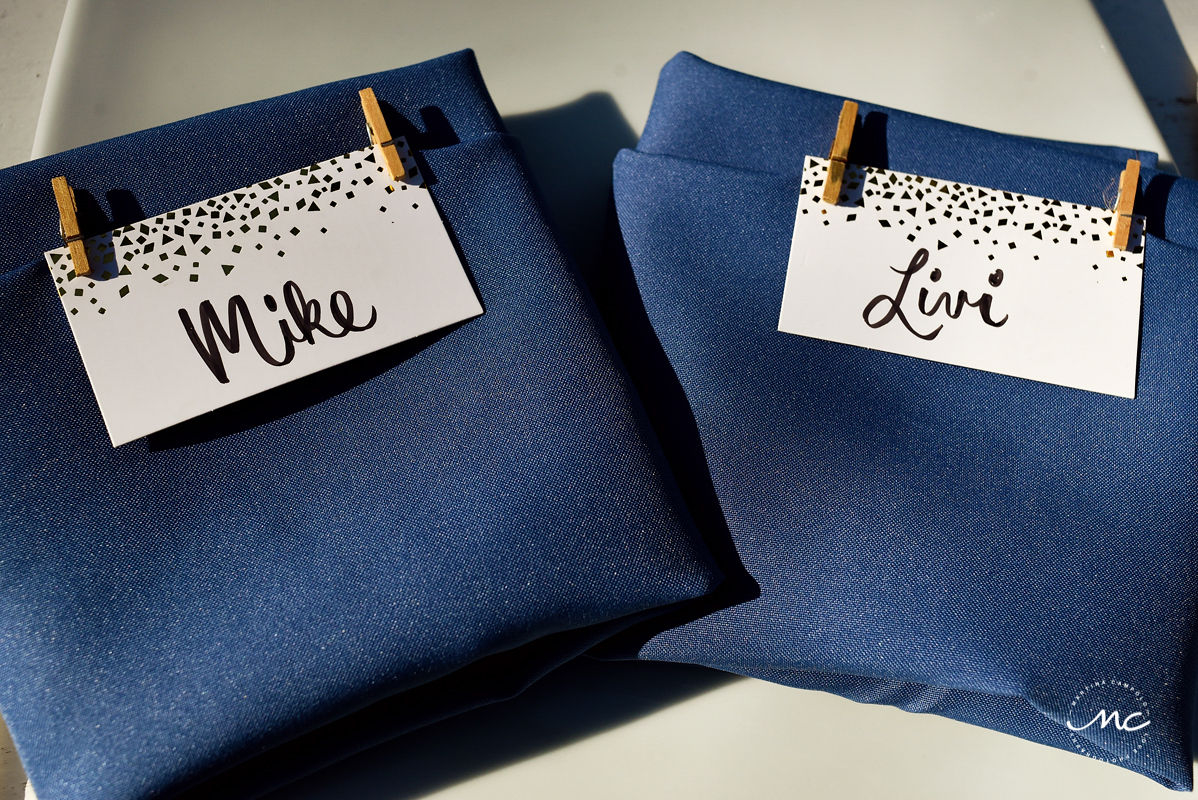 Navy blue napkin detail with name cards at Hacienda del Mar wedding in Riviera Maya, Mexico. Martina Campolo Photography