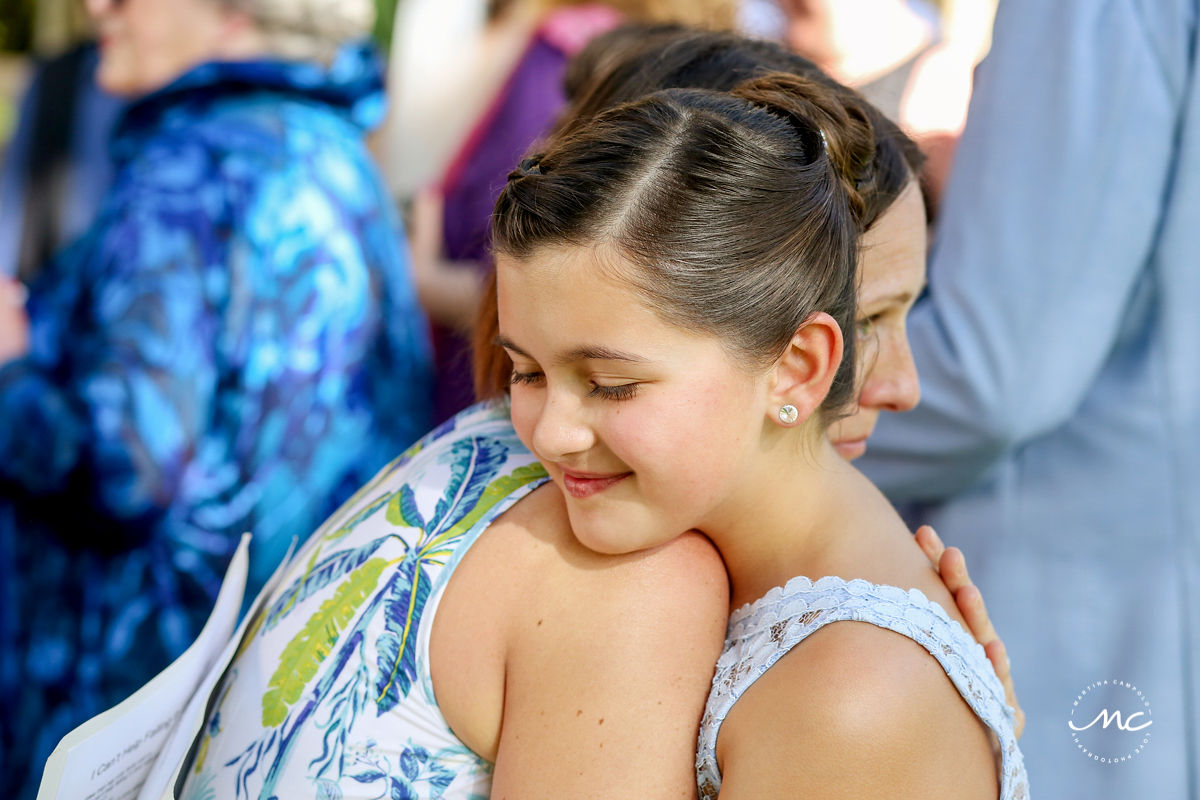 Wedding guests hug. Hacienda del Mar destination wedding in Mexico by Martina Campolo Photography