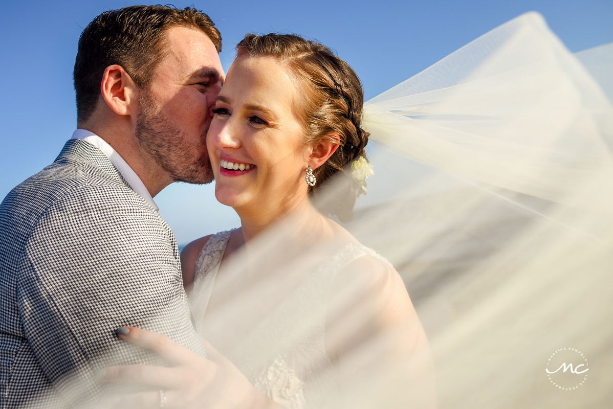 Closeup bride and groom portrait with wedding veil by Martina Campolo Riviera Maya Wedding Photography