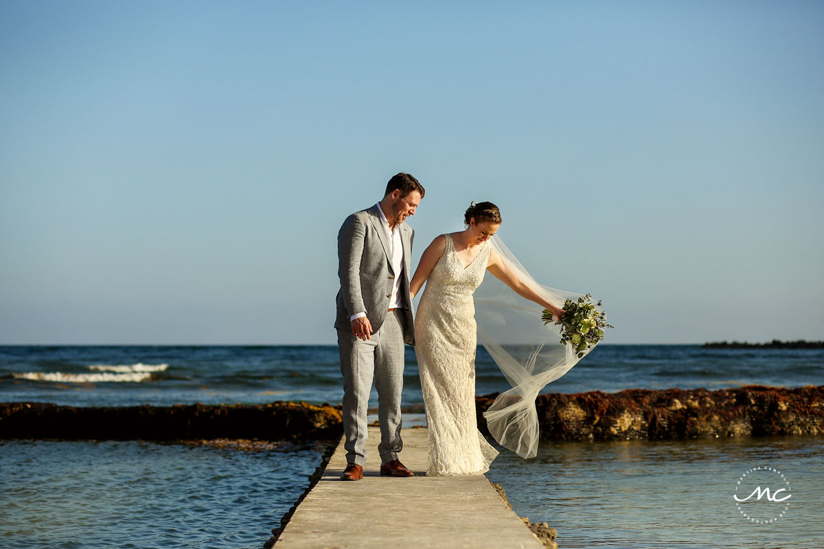 Bride and groom portraits with cathedral veil on the beach. Hacienda del Mar wedding in Mexico by Martina Campolo Photography