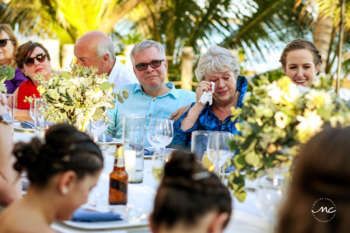 Wedding reception table with guests. Hacienda del Mar destination wedding in Mexico by Martina Campolo Photography