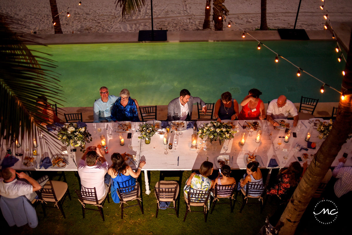 Aerial view of Hacienda del Mar poolside wedding reception with bistro lights in Mexico. Martina Campolo Photography